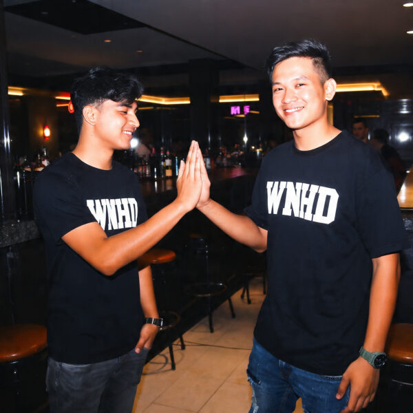 2-young-men-high=fiving